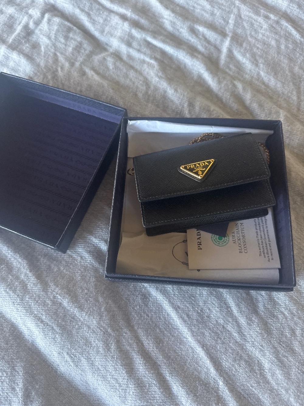 Prada saffiano leather black wallet with gold chain